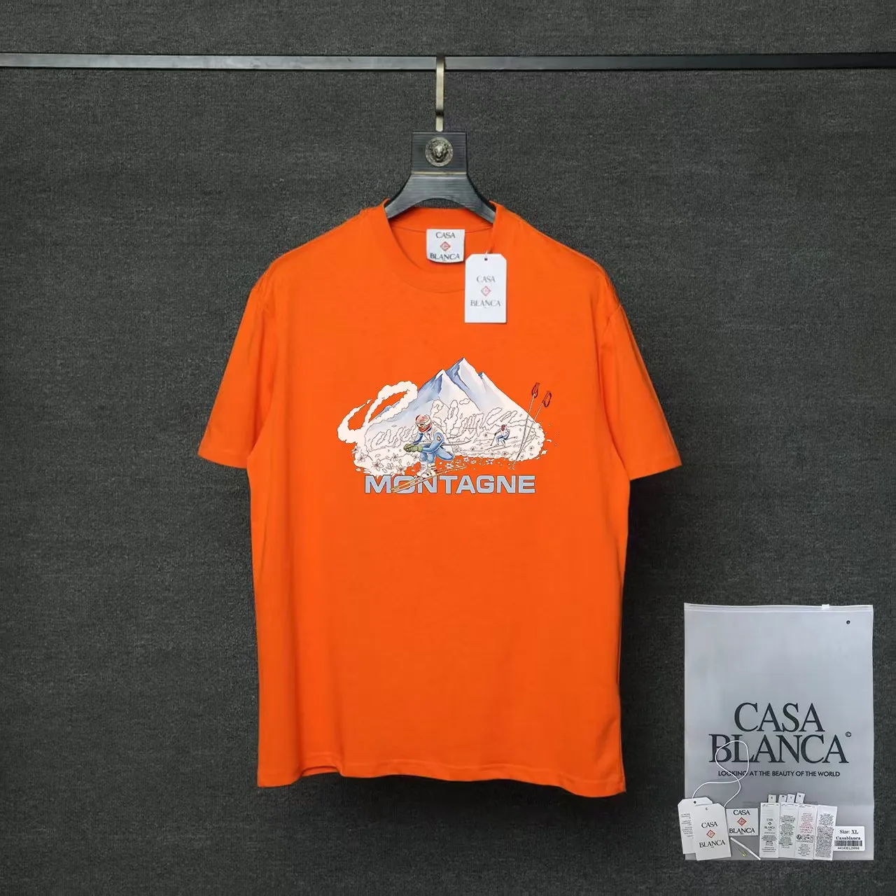 26ss CASABLANCA original printing process short-sleeved T-shirt original development using high-density double yarn pure cotton fabric upper body soft and comfortable color Black White Dark Green color Orange Pink Blue Royal Blue color cigarette powder 8 colors Sizes S M L XL